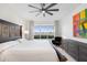 Main bedroom with large bed and city view at 231 Riverside Drive # 101-1, Holly Hill, FL 32117