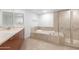 Bathroom with soaking tub and walk-in shower at 231 Riverside Drive # 101-1, Holly Hill, FL 32117