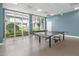 Recreation room featuring ping pong and air hockey tables at 231 Riverside Drive # 101-1, Holly Hill, FL 32117