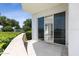 Outdoor patio with seating and access to interior at 231 Riverside Drive # 101-1, Holly Hill, FL 32117
