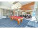 Game room with billiard table and comfortable seating at 231 Riverside Drive # 101-1, Holly Hill, FL 32117