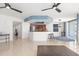 Spacious living room with hardwood floors and ceiling fans at 231 Riverside Drive # 101-1, Holly Hill, FL 32117