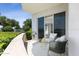 Outdoor patio with seating and access to interior at 231 Riverside Drive # 101-1, Holly Hill, FL 32117