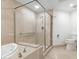 Bathroom with shower and soaking tub at 231 Riverside Drive # 101-1, Holly Hill, FL 32117