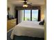 Main bedroom with king-size bed and ocean view at 4175 S Atlantic Ave # 1020, New Smyrna Beach, FL 32169