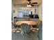 Dining area with table and chairs, kitchen view at 4175 S Atlantic Ave # 1020, New Smyrna Beach, FL 32169