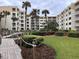 Courtyard with grassy area and walkway at 4175 S Atlantic Ave # 1020, New Smyrna Beach, FL 32169