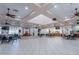 Large community room with high ceilings, stage, and seating at 332 David Walker Dr # J-2, Tavares, FL 32778