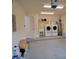 Garage with washer, dryer, utility sink, and ample storage at 332 David Walker Dr # J-2, Tavares, FL 32778