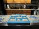 Stylish kitchen counter with a blue tray and starfish decor at 3700 S Atlantic Ave # 407, New Smyrna Beach, FL 32169