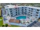 Aerial view of condo building, pool, and unit #407 at 3700 S Atlantic Ave # 407, New Smyrna Beach, FL 32169