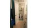 Clean bathroom with a toilet, shower, and teal accents at 3700 S Atlantic Ave # 407, New Smyrna Beach, FL 32169