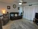Living room with comfy seating and beach theme at 3700 S Atlantic Ave # 407, New Smyrna Beach, FL 32169