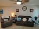 Living room with relaxing seating and beach decor at 3700 S Atlantic Ave # 407, New Smyrna Beach, FL 32169