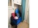 Beach cart, chairs, and other items are stored in this closet at 3700 S Atlantic Ave # 407, New Smyrna Beach, FL 32169