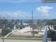 Ocean view from balcony, showing parking and beach access at 3700 S Atlantic Ave # 407, New Smyrna Beach, FL 32169