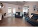Spacious living area with comfortable seating and access to outdoor space at 2019 Jaffa Ct, Clermont, FL 34714