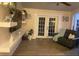 Relaxing living room with comfy seating and French doors at 2019 Jaffa Ct, Clermont, FL 34714