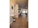 Entryway with tile flooring, floating shelves, and a mirror at 2019 Jaffa Ct, Clermont, FL 34714