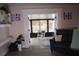 Bright sunroom with rocking chair and access to backyard at 2019 Jaffa Ct, Clermont, FL 34714