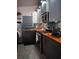 Modern kitchen with stainless steel appliances and wood countertops at 2019 Jaffa Ct, Clermont, FL 34714