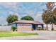 Charming curb appeal with two-car garage and landscaped yard at 2019 Jaffa Ct, Clermont, FL 34714