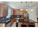 Modern kitchen with ample cabinetry, stainless steel appliances, and kitchen island at 13880 Arclid St, Orlando, FL 32832