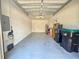 Garage with Tesla charger and ample storage space at 13880 Arclid St, Orlando, FL 32832