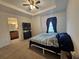 Main bedroom with ensuite bathroom access at 13880 Arclid St, Orlando, FL 32832