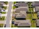 Aerial view of the house and surrounding neighborhood at 2370 Brassie Ct, Winter Haven, FL 33884