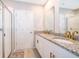 Double vanity bathroom with shower and separate toilet area at 2370 Brassie Ct, Winter Haven, FL 33884