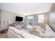 Spacious living room with large sectional sofa and access to backyard at 2370 Brassie Ct, Winter Haven, FL 33884