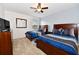 Bedroom with two twin beds and shared bathroom at 401 Cabello Dr, Davenport, FL 33837