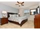 Bedroom with king bed, nightstands and dresser at 401 Cabello Dr, Davenport, FL 33837