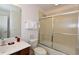 Clean bathroom with tub, shower, and updated vanity at 401 Cabello Dr, Davenport, FL 33837