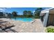 Refreshing community pool with plenty of lounge chairs at 4367 White Pine Ave # 4, Orlando, FL 32811
