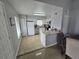 Kitchen with stainless steel appliances and a breakfast bar at 4367 White Pine Ave # 4, Orlando, FL 32811