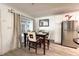 Bright dining area with table and four chairs, near kitchen at 4810 S Conway Rd # 163, Orlando, FL 32812