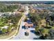 Community entrance with guardhouse and landscaping at 2669 Santosh Cv, Kissimmee, FL 34746
