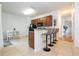 Modern kitchen with breakfast nook and a convenient kitchen island at 2669 Santosh Cv, Kissimmee, FL 34746