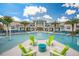 Relaxing resort-style pool with comfortable seating and fountains at 2669 Santosh Cv, Kissimmee, FL 34746