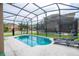 Screened pool with lounge chairs at 2669 Santosh Cv, Kissimmee, FL 34746
