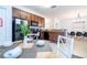 Modern kitchen with a breakfast bar and black appliances at 2669 Santosh Cv, Kissimmee, FL 34746