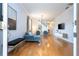 Spacious living room with hardwood floors and modern furniture at 2669 Santosh Cv, Kissimmee, FL 34746