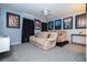 Home theater room with comfortable recliner sofas and movie posters at 2669 Santosh Cv, Kissimmee, FL 34746