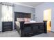 Large main bedroom with a king-size bed and ample closet space at 2669 Santosh Cv, Kissimmee, FL 34746