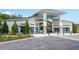 Community center with modern architectural design and landscaping at 2669 Santosh Cv, Kissimmee, FL 34746