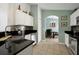 Modern kitchen features stainless steel appliances and granite countertops at 112 Paloma Dr, Davenport, FL 33837