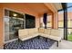 Relaxing enclosed patio with sectional sofa and rug at 112 Paloma Dr, Davenport, FL 33837