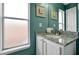 Bathroom with granite countertop and white vanity at 112 Paloma Dr, Davenport, FL 33837